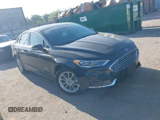 2019 Ford Fusion Hybrid SEL with VIN 3FA6P0MU5KR203851, listed as a IAAI auction lot 41982637 with 96,954 mi miles. Bid and sale history available at carsss.com. Image 1.