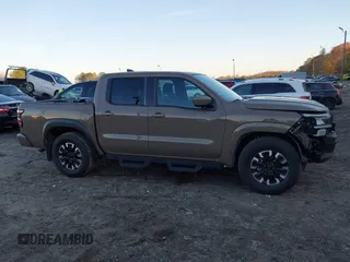 2022 Nissan Frontier SV z VIN 1N6ED1EJ3NN648912, wystawiony jako IAAI lot #40888927 z przebiegiem 59 633 mil mil oraz . Historia ofert i sprzedaży dostępna na DreamBid. Obrazek 14.