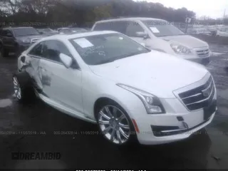 2016 Cadillac ATS AWD z VIN 1G6AG1RX6G0153467, wystawiony jako IAAI lot #30572889 z przebiegiem 38 447 mil mil oraz . Historia ofert i sprzedaży dostępna na DreamBid. Obrazek 1.