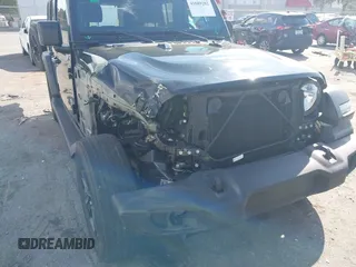 2023 Jeep Wrangler Willys with VIN 1C4HJXDN1PW634763, listed as a IAAI auction lot 41689202 with 23,369 mi miles and . Bid and sale history available at DreamBid. Image 6.