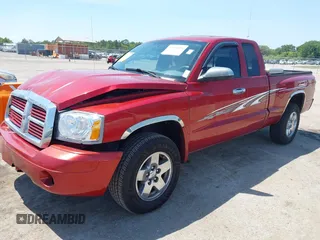 2006 Dodge Dakota SLT with VIN 1D7HE42K96S570558, listed as a IAAI auction lot 42016089 with 144,365 mi miles and . Bid and sale history available at carsss.com. Image 2.