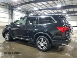 2016 Honda Pilot EX-L with VIN 5FNYF6H54GB056149, listed as a Copart auction lot 52232145 with 168,925 mi miles and Salvage Title. Bid and sale history available at carsss.com. Image 2.