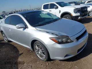 2010 Scion tC with VIN JTKDE3B75A0321993, listed as a IAAI auction lot 41956324 with 135,852 mi miles. Bid and sale history available at carsss.com. Image 1.