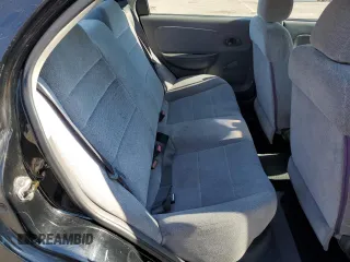 2001 Kia Spectra GS z VIN KNAFB161115036033, wystawiony jako Copart lot #55939335 z przebiegiem 76 414 mil mil oraz Szkoda całkowita • Salvage title. Historia ofert i sprzedaży dostępna na DreamBid. Obrazek 10.