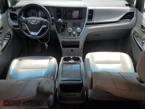 2015 Toyota Sienna XLE with VIN 5TDYK3DCXFS668851, listed as a Copart auction lot 60452005 with 205,549 mi miles and Salvage title. Bid and sale history available at DreamBid. Image 8.
