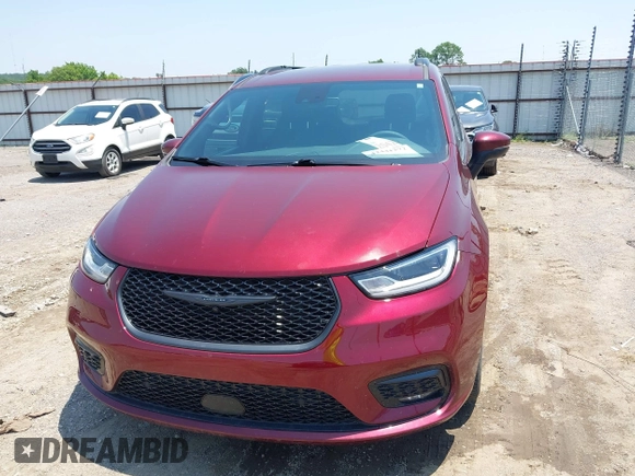 2023 Chrysler Pacifica Touring L with VIN 2C4RC1BG7PR513017, listed as a IAAI auction lot 42441272 with 23,310 mi miles and . Bid and sale history available at DreamBid. Image 6.