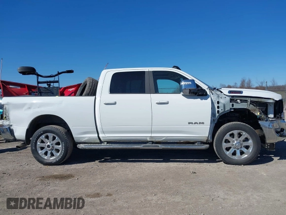 2023 Ram 2500 Laramie with VIN 3C6UR5FJ9PG530727, listed as a IAAI auction lot 41803946 with 19,992 mi miles and . Bid and sale history available at DreamBid. Image 14.