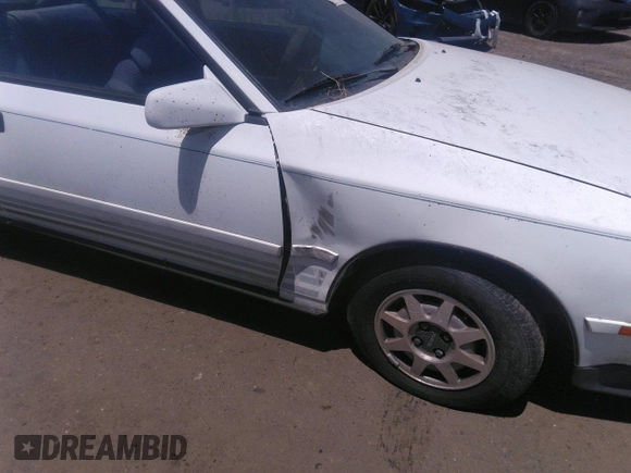 1989 Toyota Celica z VIN JT2ST67L2K7347514, wystawiony jako IAAI lot #39235389 z przebiegiem 140 135 mil mil oraz . Historia ofert i sprzedaży dostępna na DreamBid. Obrazek 13.