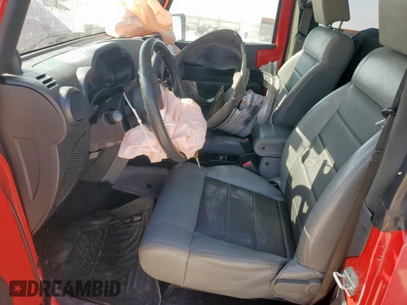2009 Jeep Wrangler X with VIN 1J4FA24189L776078, listed as a Copart auction lot 57902705 with 104,994 mi miles and Salvage title. Bid and sale history available at DreamBid. Image 7.