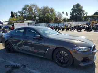 2023 BMW 8 Series M850i with VIN WBAGV8C09PCK67931, listed as a Copart auction lot 37561734 with 7,970 mi miles. Bid and sale history available at carsss.com. Image 4.