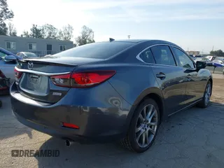 2015 Mazda 6 i Grand Touring with VIN JM1GJ1W55F1220578, listed as a IAAI auction lot 42076034 with 77,904 mi miles and . Bid and sale history available at carsss.com. Image 4.
