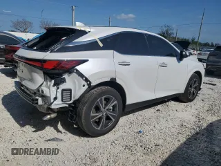 2023 Lexus RX with VIN 2T2BAMBA1PC022197, listed as a Copart auction lot 53846754 with 7,395 mi miles and Salvage Title. Bid and sale history available at carsss.com. Image 3.