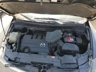 2015 Mazda CX-9 Sport z VIN JM3TB2BAXF0447315, wystawiony jako Copart lot #60842505 z przebiegiem 122 281 mil mil oraz Szkoda całkowita • Salvage title. Historia ofert i sprzedaży dostępna na DreamBid. Obrazek 12.