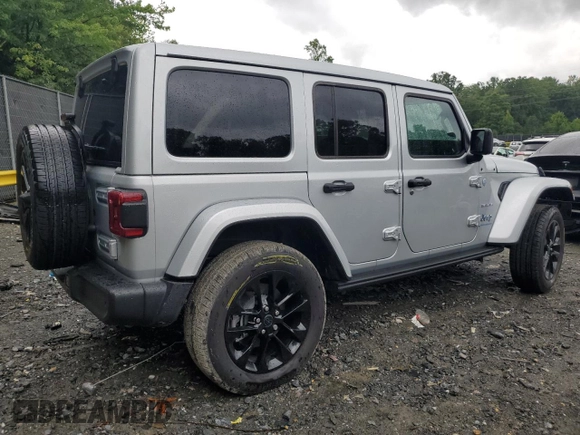 2024 Jeep Wrangler Sahara with VIN 1C4RJXP65RW210689, listed as a Copart auction lot 66482724 with 4,872 mi miles and Salvage Title. Bid and sale history available at DreamBid. Image 3.