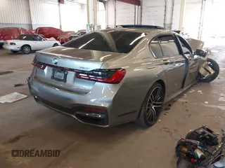 2020 BMW 7 Series 750i xDrive with VIN WBA7U2C07LGJ59164, listed as a IAAI auction lot 42001056 with Not provided miles and . Bid and sale history available at DreamBid. Image 4.