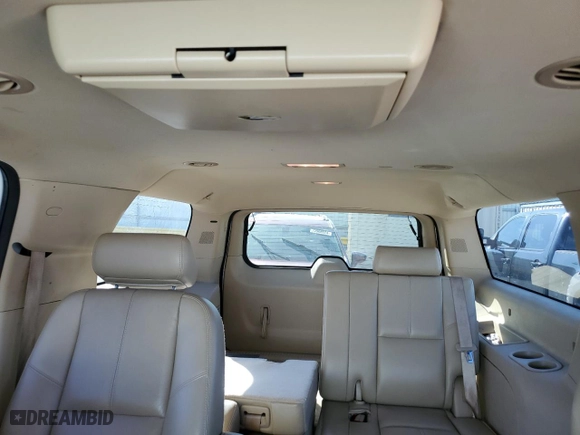 2009 Chevrolet Suburban LT w/2LT with VIN 1GNFC26J89R301726, listed as a Copart auction lot 73559004 with 188,380 mi miles and Salvage Title. Bid and sale history available at carsss.com. Image 10.