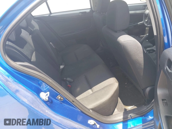 2012 Mitsubishi Lancer SE z VIN JA32V2FW0CU012937, wystawiony jako IAAI lot #42602100 z przebiegiem 143 946 mil mil oraz . Historia ofert i sprzedaży dostępna na DreamBid. Obrazek 8.