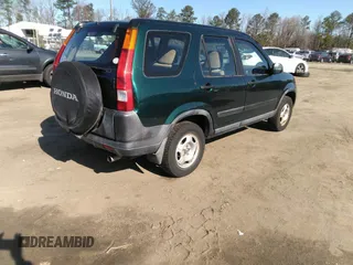 2004 Honda CR-V LX with VIN SHSRD78424U242493, listed as a IAAI auction lot 41833047 with 206,882 mi miles and . Bid and sale history available at carsss.com. Image 4.