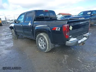 2012 Chevrolet Colorado LT w/2LT with VIN 1GCHTDFE5C8100654, listed as a IAAI auction lot 41213103 with 230,065 mi miles. Bid and sale history available at carsss.com. Image 3.