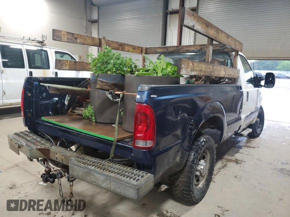 1999 Ford F-250 XL with VIN 1FTNF21F8XEE75010, listed as a Copart auction lot 54532975 with 239,935 mi miles and Salvage title. Bid and sale history available at DreamBid. Image 3.