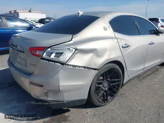 2014 Maserati Ghibli S Q4 with VIN ZAM57RTA8E1095303, listed as a IAAI auction lot 41600587 with 98,215 mi miles. Bid and sale history available at carsss.com. Image 17.