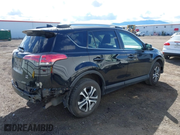 2018 Toyota RAV4 LE with VIN 2T3BFREV2JW749735, listed as a IAAI auction lot 41998068 with 112,468 mi miles. Bid and sale history available at carsss.com. Image 4.