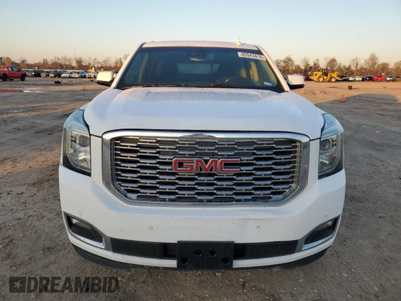 2019 GMC Yukon Denali with VIN 1GKS1CKJ6KR122376, listed as a Copart auction lot 85943414 with 90,614 mi miles and Salvage Title. Bid and sale history available at carsss.com. Image 5.