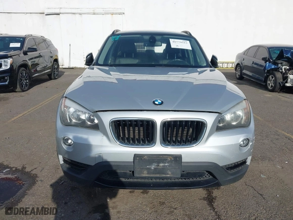 2014 BMW X1 sDrive28i with VIN WBAVM1C58EVW52847, listed as a IAAI auction lot 40779553 with 151,076 mi miles. Bid and sale history available at carsss.com. Image 12.