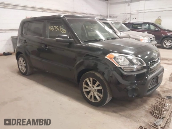 2012 Kia Soul + with VIN KNDJT2A60C7457882, listed as a IAAI auction lot 42050050 with 153,560 mi miles. Bid and sale history available at carsss.com. Image 1.