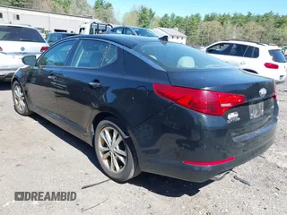 2013 Kia Optima EX with VIN 5XXGN4A77DG216998, listed as a IAAI auction lot 42102377 with 204,354 mi miles. Bid and sale history available at carsss.com. Image 3.