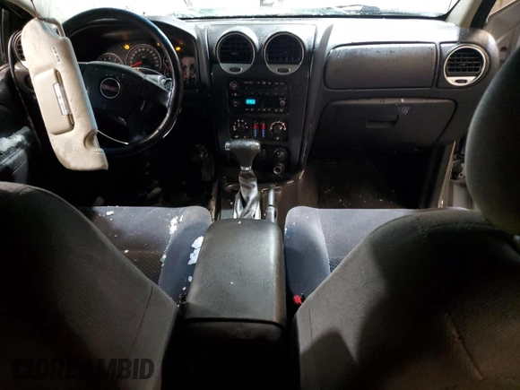 2007 GMC Envoy SLE with VIN 1GKDT13S572301992, listed as a Copart auction lot 87404174 with 131,741 mi miles and Salvage Title. Bid and sale history available at carsss.com. Image 8.