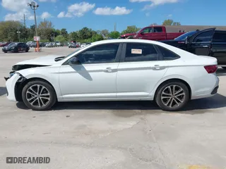 2024 Volkswagen Jetta Sport with VIN 3VWBM7BU5RM048137, listed as a IAAI auction lot 41695098 with 7,084 mi miles. Bid and sale history available at carsss.com. Image 14.
