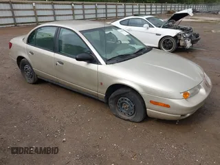 2000 Saturn SL with VIN 1G8ZH5287YZ262924, listed as a IAAI auction lot 42068691 with 161,975 mi miles. Bid and sale history available at carsss.com. Image 1.