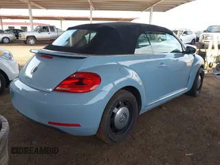 2013 Volkswagen Beetle 2.5L with VIN 3VW5P7AT9DM830477, listed as a IAAI auction lot 41957389 with Not Provided miles and . Bid and sale history available at DreamBid. Image 4.