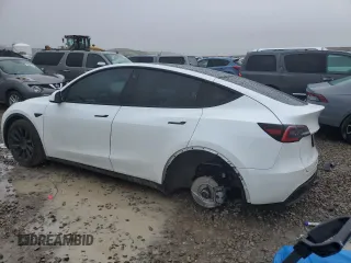2020 Tesla Model Y Long Range z VIN 5YJYGDEE4LF052702, wystawiony jako Copart lot #53243385 z przebiegiem 75 917 mil mil oraz Szkoda całkowita • Salvage title. Historia ofert i sprzedaży dostępna na DreamBid. Obrazek 2.