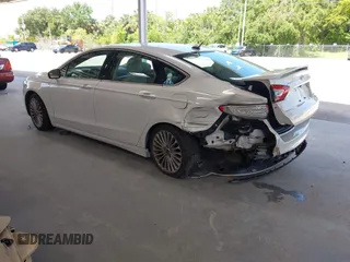 2016 Ford Fusion Titanium with VIN 3FA6P0K96GR390989, listed as a IAAI auction lot 42634275 with 123,559 mi miles and . Bid and sale history available at DreamBid. Image 3.