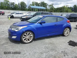 2012 Hyundai Veloster w/Black Int with VIN KMHTC6AD8CU027271, listed as a Copart auction lot 63057155 with 153,048 mi miles and Clean title. Bid and sale history available at DreamBid. Image 1.