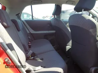 2009 Toyota Yaris with VIN JTDKT903095246576, listed as a Copart auction lot 52150915 with 90,276 mi miles and Salvage Title. Bid and sale history available at DreamBid. Image 10.