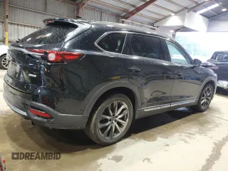 2016 Mazda CX-9 Grand Touring with VIN JM3TCADY2G0104050, listed as a Copart auction lot 56581425 with 100,737 mi miles and Salvage title. Bid and sale history available at DreamBid. Image 3.