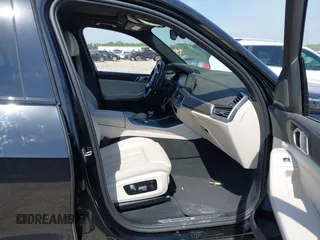 2021 BMW X5 xDrive40i with VIN 5UXCR6C01M9E66976, listed as a IAAI auction lot 42024110 with 67,877 mi miles and . Bid and sale history available at DreamBid. Image 5.