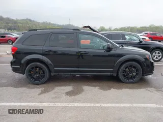 2013 Dodge Journey SXT with VIN 3C4PDDBG4DT660474, listed as a IAAI auction lot 41984607 with 124,926 mi miles and . Bid and sale history available at DreamBid. Image 14.