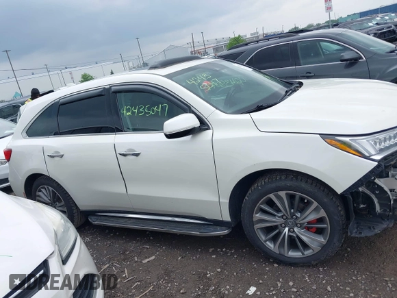 2017 Acura MDX Technology z VIN 5FRYD4H52HB025623, wystawiony jako IAAI lot #42435047 z przebiegiem 63 199 mil mil oraz . Historia ofert i sprzedaży dostępna na DreamBid. Obrazek 13.