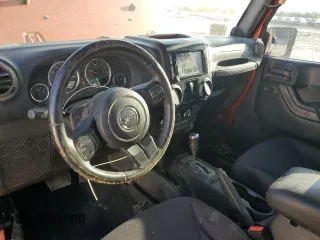 2014 Jeep Wrangler Sport with VIN 1C4AJWAG8EL169530, listed as a Copart auction lot 51788825 with 197,642 mi miles and Salvage Title. Bid and sale history available at carsss.com. Image 8.