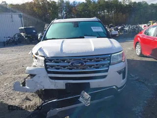 2019 Ford Explorer Limited z VIN 1FM5K7F82KGA03297, wystawiony jako IAAI lot #40847611 z przebiegiem 104 904 mil mil oraz . Historia ofert i sprzedaży dostępna na DreamBid. Obrazek 12.