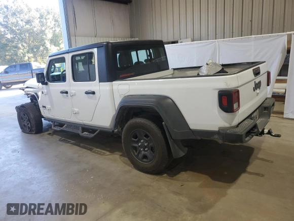2022 Jeep Gladiator Sport S with VIN 1C6JJTAG9NL176055, listed as a Copart auction lot 83069084 with 53,752 mi miles and Salvage title. Bid and sale history available at DreamBid. Image 2.