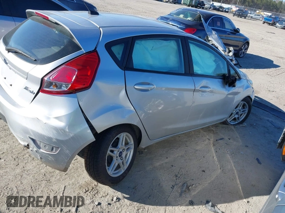 2018 Ford Fiesta SE with VIN 3FADP4EJ1JM114972, listed as a IAAI auction lot 41254391 with 28,114 mi miles and . Bid and sale history available at carsss.com. Image 4.