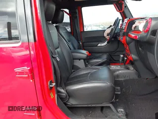 2016 Jeep Wrangler Unlimited Rubicon with VIN 1C4BJWFG1GL293302, listed as a IAAI auction lot 41811485 with 30,101 mi miles and . Bid and sale history available at DreamBid. Image 5.