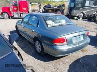 2004 Hyundai Sonata with VIN KMHWF25S74A048301, listed as a IAAI auction lot 41790506 with 179,740 mi miles. Bid and sale history available at carsss.com. Image 3.