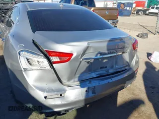 2015 Maserati Ghibli z VIN ZAM57XSA7F1135961, wystawiony jako IAAI lot #40831583 z przebiegiem 89 671 mil mil oraz . Historia ofert i sprzedaży dostępna na DreamBid. Obrazek 6.