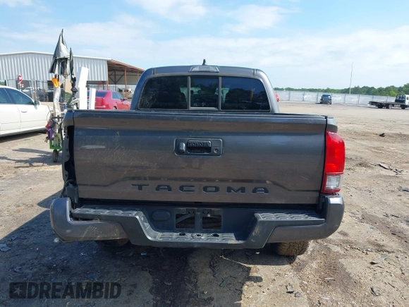 2022 Toyota Tacoma SR z VIN 3TYAX5GN5NT046897, wystawiony jako IAAI lot #42253604 z przebiegiem 69 246 mil mil oraz . Historia ofert i sprzedaży dostępna na DreamBid. Obrazek 16.